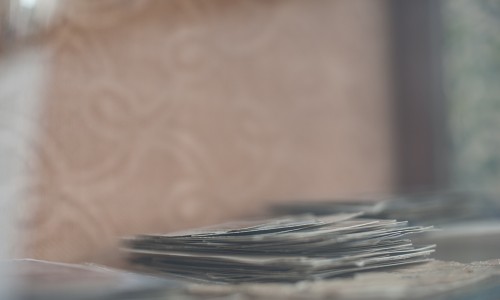 astract photography with sheets of paper in the foreground